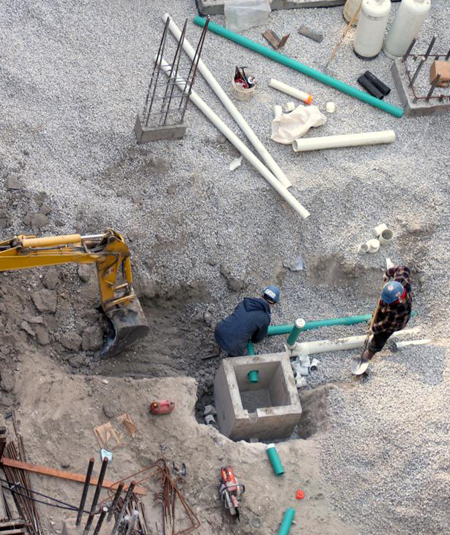 Men Digging a Hole